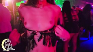 Tits out on the dancefloor at a packed night club!