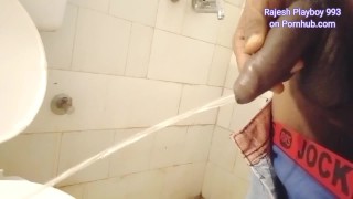 Rajesh Playboy 993 dual pissing in the bathroom videos merged in one single video