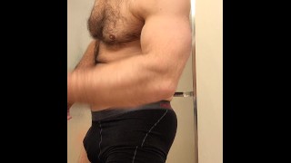 HAIRY MUSCLE BEAR FLEXING