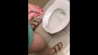 Hung guy freeballing at casino, big dick got hard so took off pants in bathroom and squirted a load.