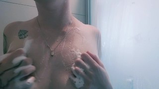 Natural blonde shows off armpits in shower